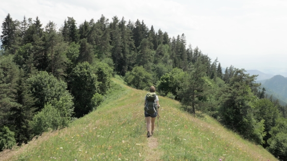 Young Girl Walks in the Mountain with Bakpack - Georgia National Park