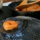 the Cook Pulls the Donuts Out of the Frying Pan - VideoHive Item for Sale