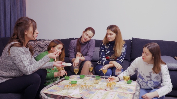 Young Girls Spend Their Evening Together and Eats Sushi at Home