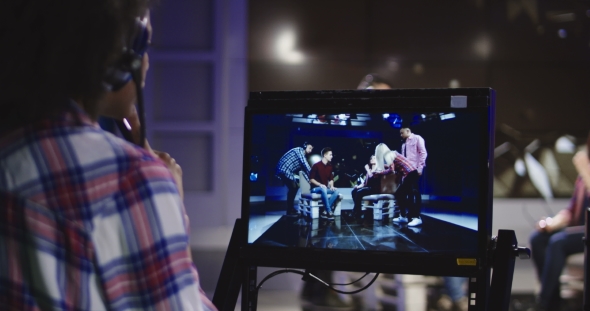 Stage Director Watching Show in Record