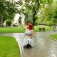 A Girl in the Park Makes Selfie on the Phone - VideoHive Item for Sale