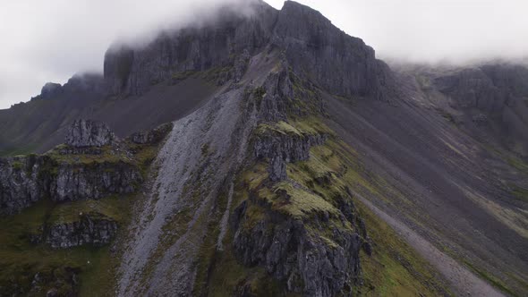 Drone Flight Towards Man Standing On Mountain Ridge