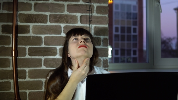 Young Business Woman at Office with a Sore Throat