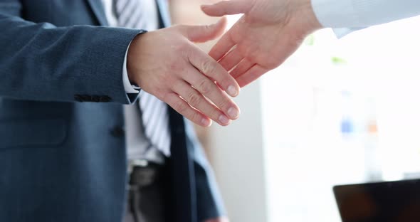 Businessman in Suit Stretching Out His Hand for Handshake Closeup  Movie Slow Motion