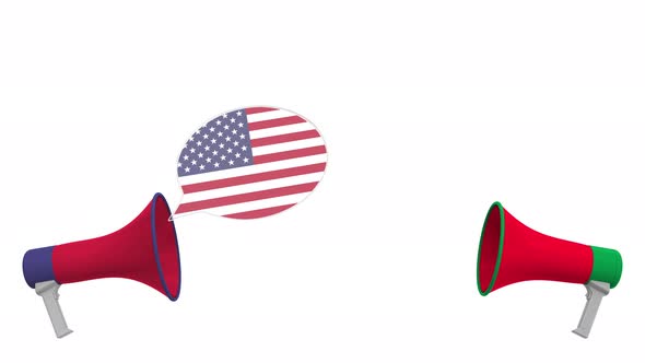 Flags of Syria and the USA on Speech Bubbles
