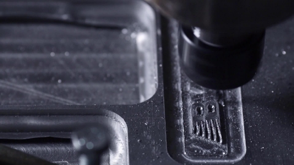  Drill Bit Slowly Carves Out the Aluminum Plate