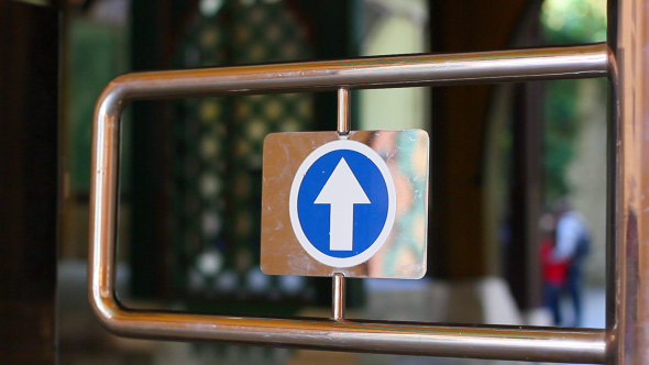 Entering Through Turnstile