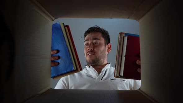 Bottom View Take Books Out of the Cardboard Box