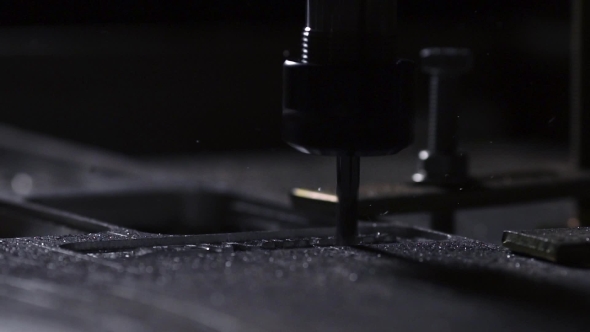 The Plant for the Production of Metal Products Using a Lathe Creates a Lid for the Case of a Laptop