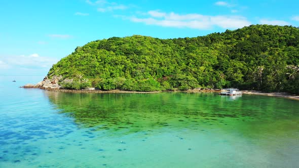 Aerial drone view landscape of beautiful resort beach voyage by blue sea with bright sandy backgroun