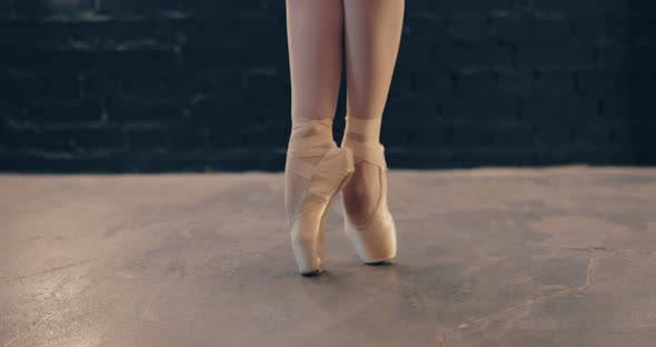 Legs of a Ballerina in Pointe Close Up