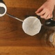 Barista pouring water on coffee ground with filter - VideoHive Item for Sale
