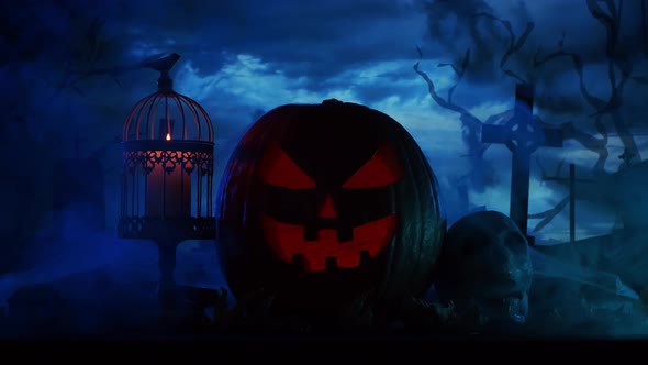 Scary laughing pumpkin and an old skull over the frightening gothic background.