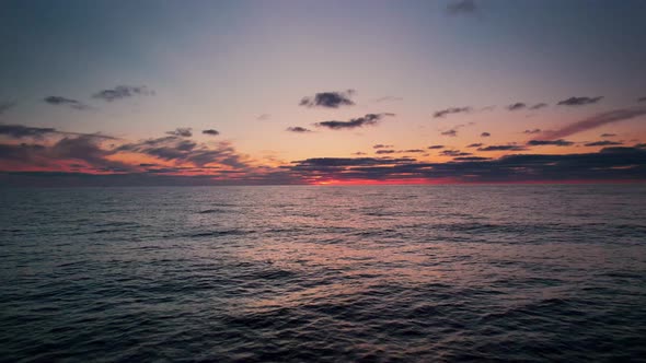 Drone Over Sea And Beach At Sunset