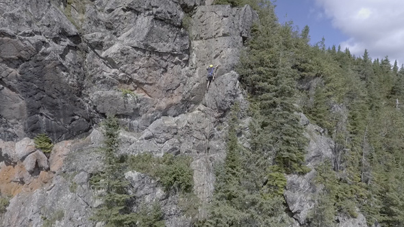 Flyover a Rock Climber