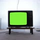 Old Tv Green Screen in the Middle of a room. Aesthetics of the 80s. - VideoHive Item for Sale
