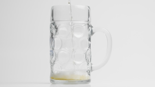 Beer Pouring Into Glass