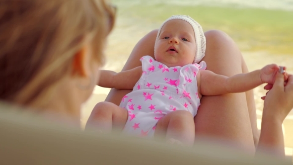 Mom Doing Exercise with Baby Outdoor