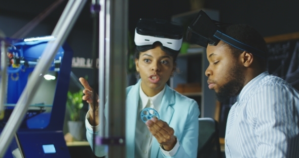 Colleagues in VR Glasses Having Meeting