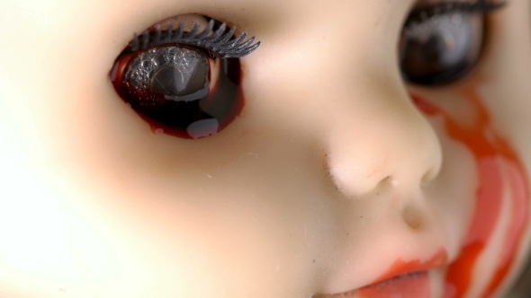 The Doll Rolled Tears of Blood From His Eyes As If She Was Crying