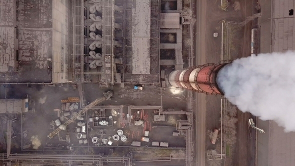 Aerial View Emission To Atmosphere From Industrial Pipes Smokestack Pipes Shooted with Drone