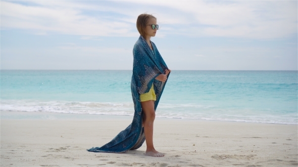 Little Girl Have Fun on the Beach