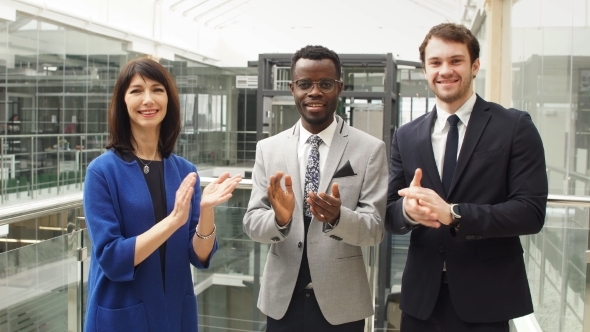Multiethic Business Colleagues Clapping Hands Themselves or They Leader with Increase
