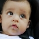 Face Tanned Baby Boy Six Months Sitting in a Stroller - VideoHive Item for Sale