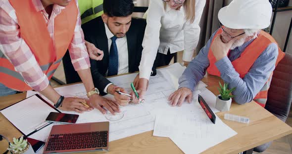 Engineers-Constructors and Main Manager which Working Together Over New Building Project