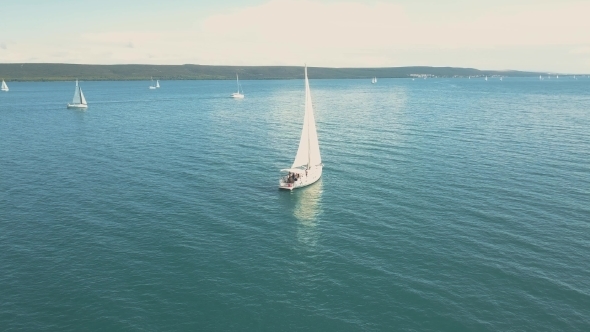 Aerial View of Yacht Sailing Near Beautiful Islands
