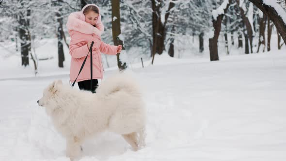 Girl with a Dog Samoyed