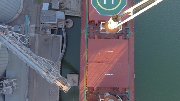 Aerial View of Big Grain Elevators on the Sea alt