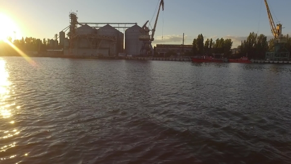 Aerial View of Big Grain Elevators on the Sea alt