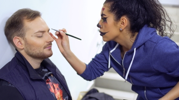 Actors Prepares To Perform on Scene and Makes Greasepaint on Face