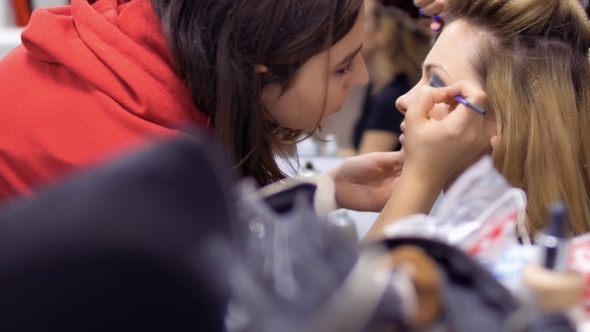 Professional Make-up Artist and Hairdresser Prepares Woman To the Performance