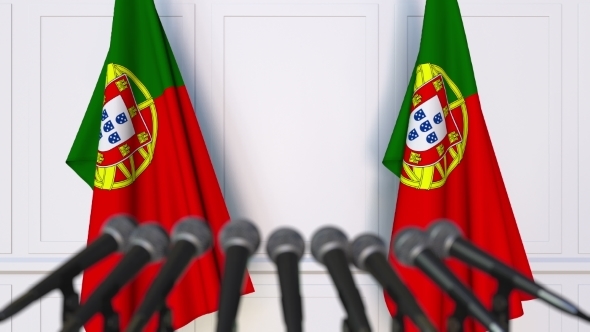 Portuguese Official Press Conference Featuring Flags of Portugal alt