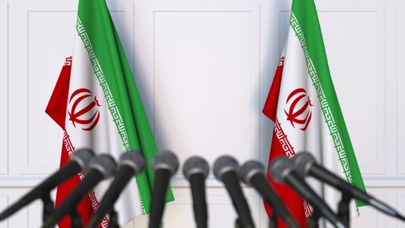 Iranian Official Press Conference Featuring Flags of Iran alt