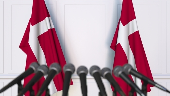 Danish Official Press Conference Featuring Flags of Denmark alt