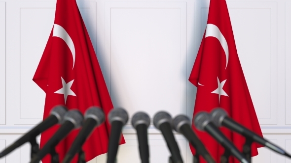 Turkish Official Press Conference Featuring Flags of Turkey alt