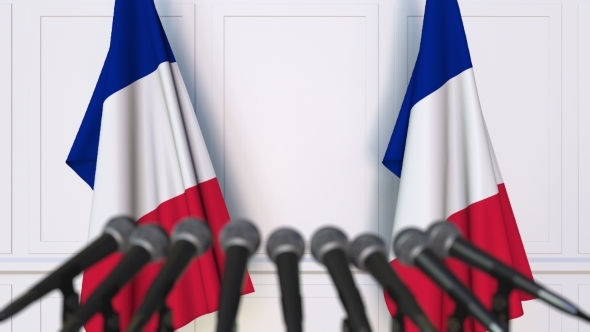French Official Press Conference Featuring Flags of France alt