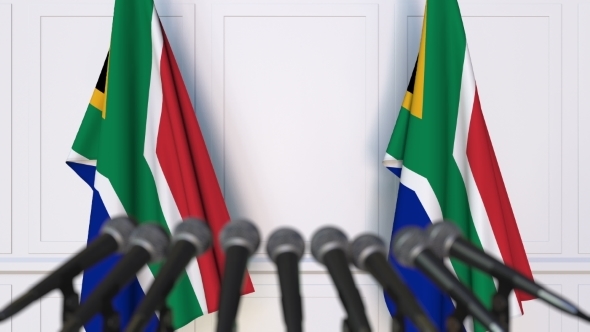 SAR Official Press Conference Featuring Flags of South Africa alt