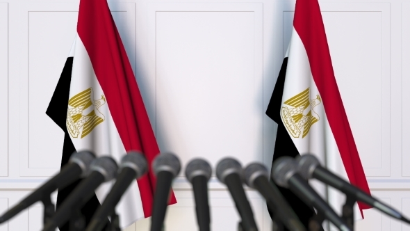 Egyptian Official Press Conference Featuring Flags of Egypt alt