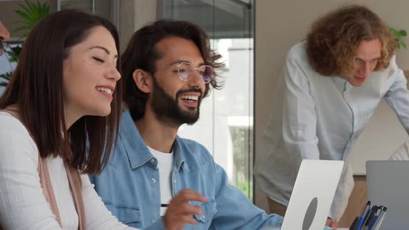 Workers in an Office Working As a Team Happily