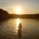 Mother and Child Bathe in River against the Sunset - VideoHive Item for Sale