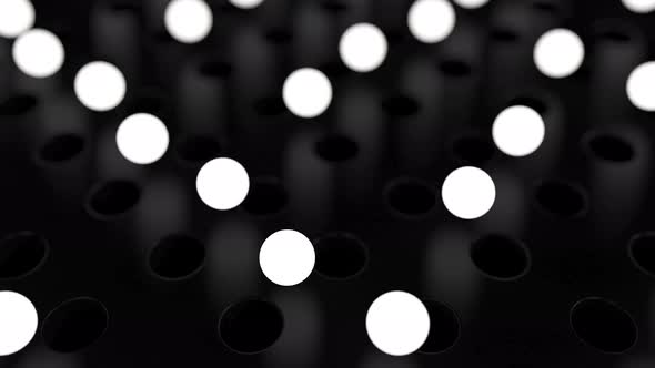 White Glowing Spheres Jump From One Hole To Another