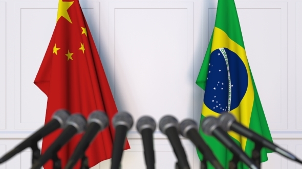 Flags of China and Brazil at International Press Conference alt