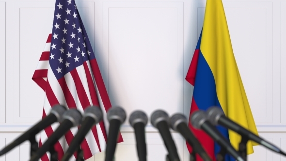 Flags of the USA and Colombia at International Press Conference alt