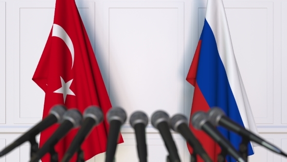 Flags of Turkey and Russia at International Press Conference alt