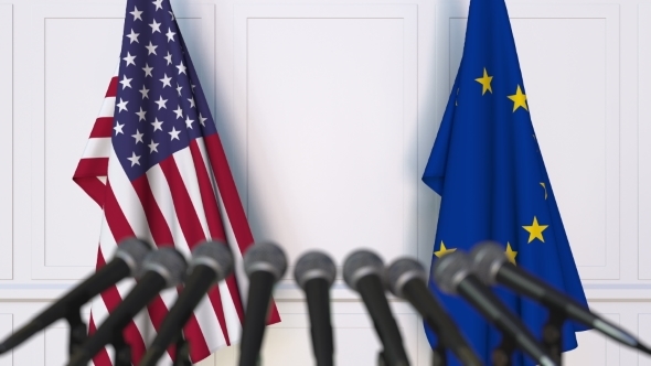 Flags of the USA and the European Union at International Press Conference alt