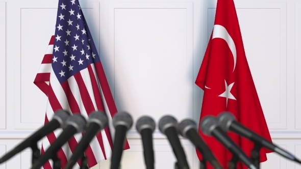 Flags of the USA and Turkey at International Press Conference alt